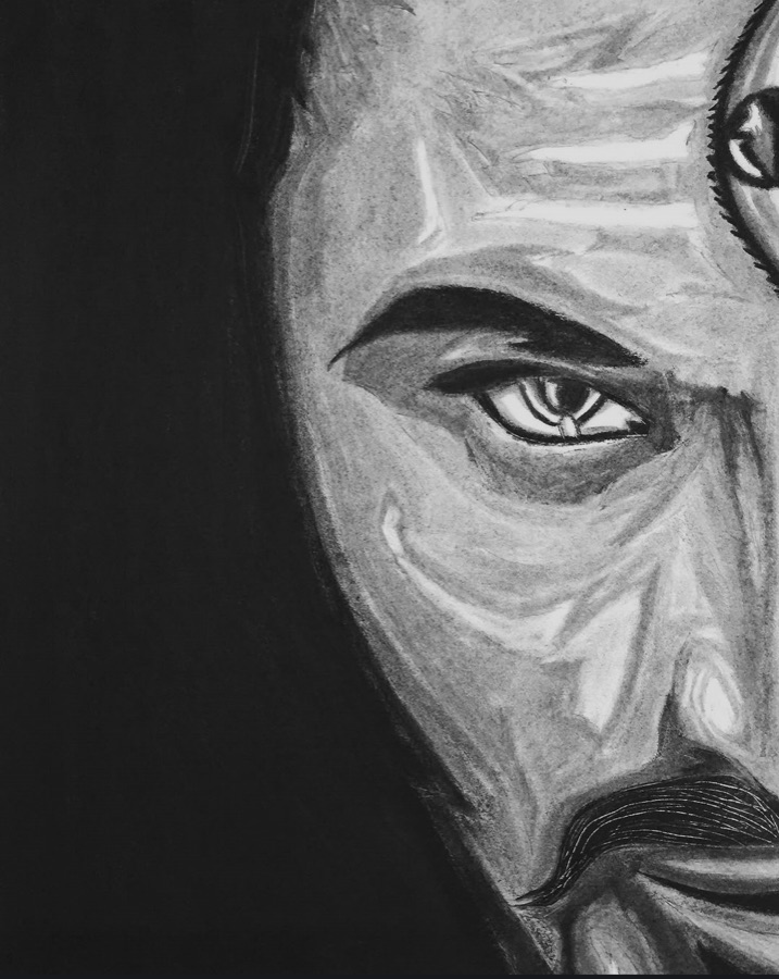 A close-up drawing of half a face, an expressive eye, and a curled moustache